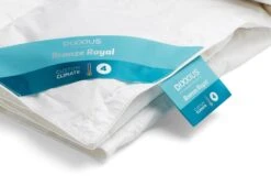 Dixxius Bronze Royal Custom Climate Partnerdekbed -Exporteren Droomnest Winkel climate partnerdekbed opgerold detail label